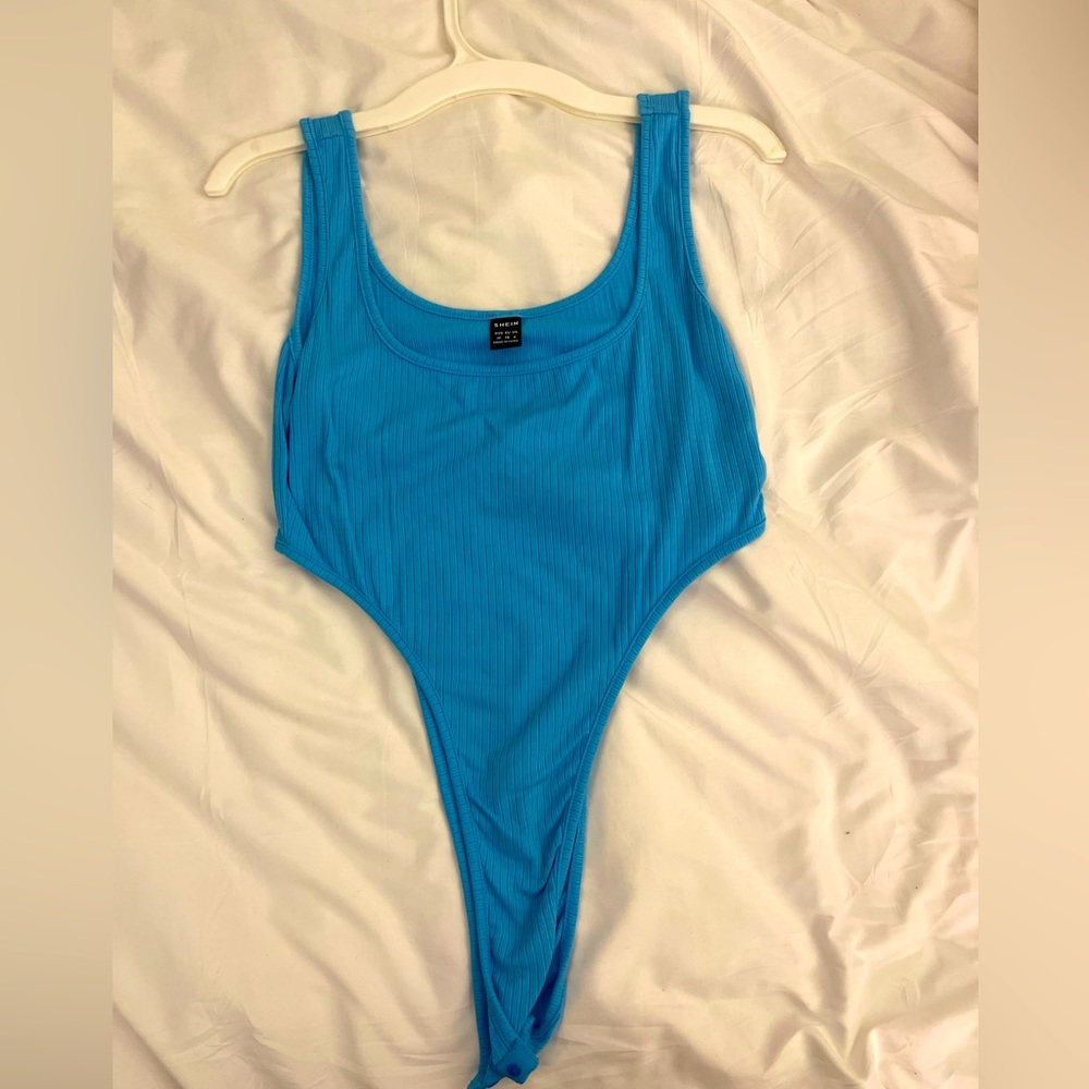 Blue body suit